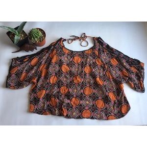 Cropped blouse with open back and adjustable tie